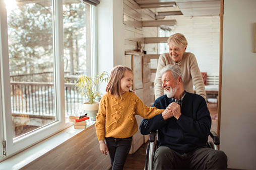 Man in wheelchair with child