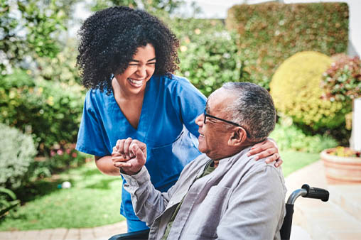 Nurse and man in wheelchair