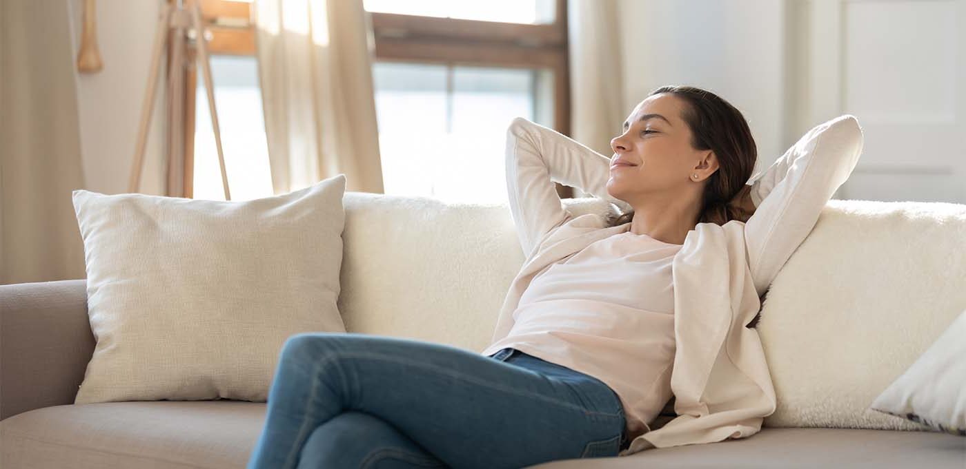 woman relaxing on couch